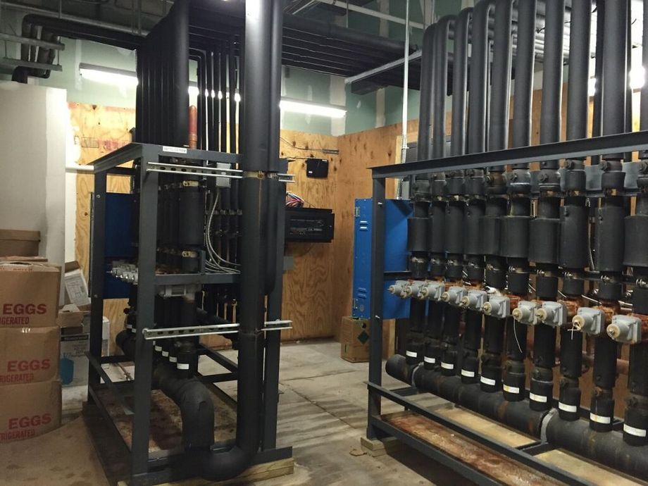 A warehouse filled with lots of pipes and boxes.
