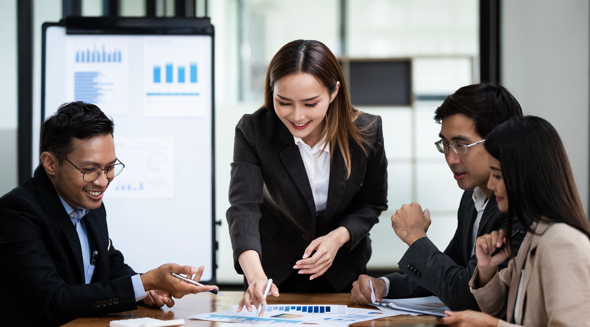executives talk strategy in boardroom