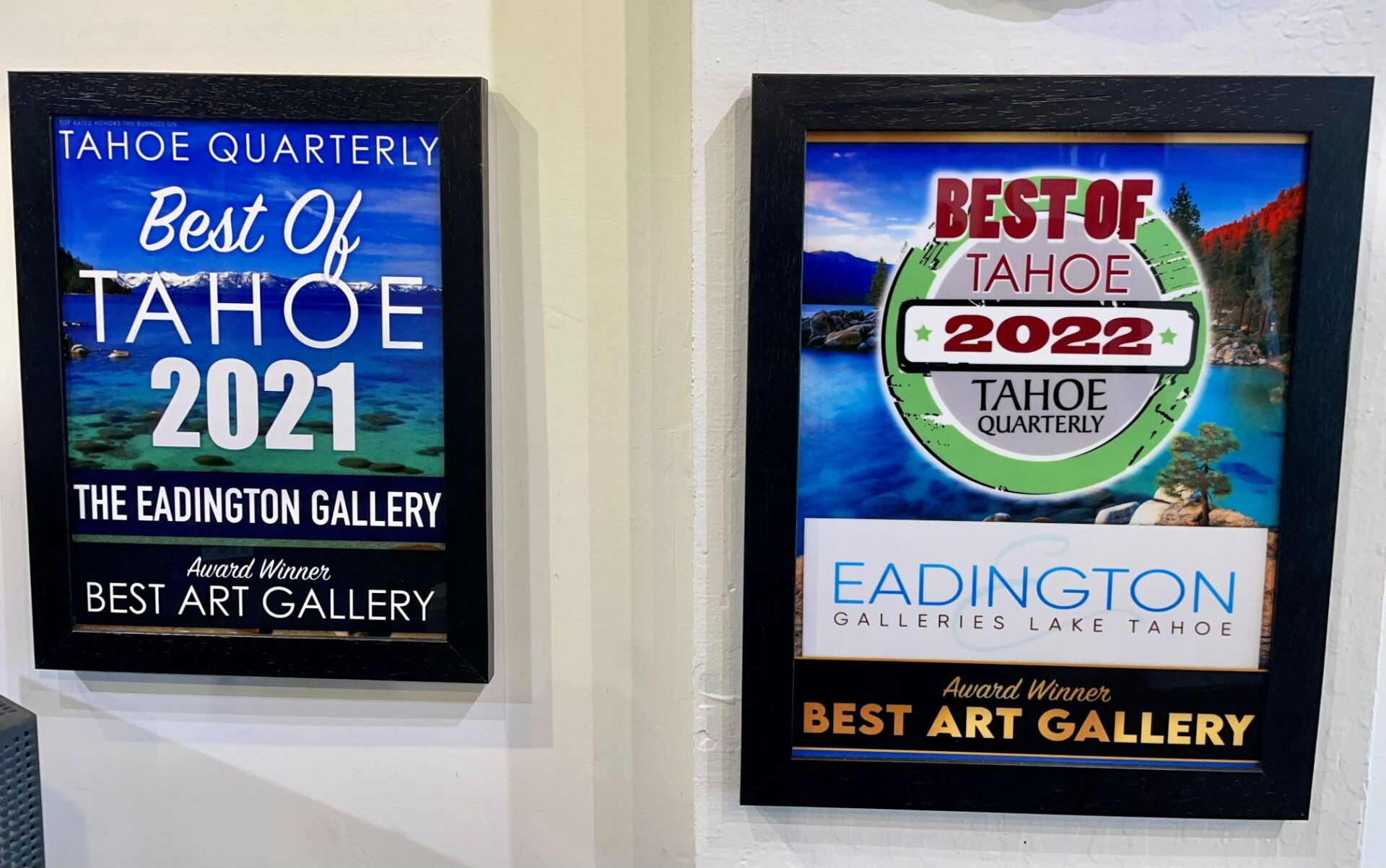 Two framed Best of Tahoe 2021 and 2023 awards for an art gallery hang on a wall.