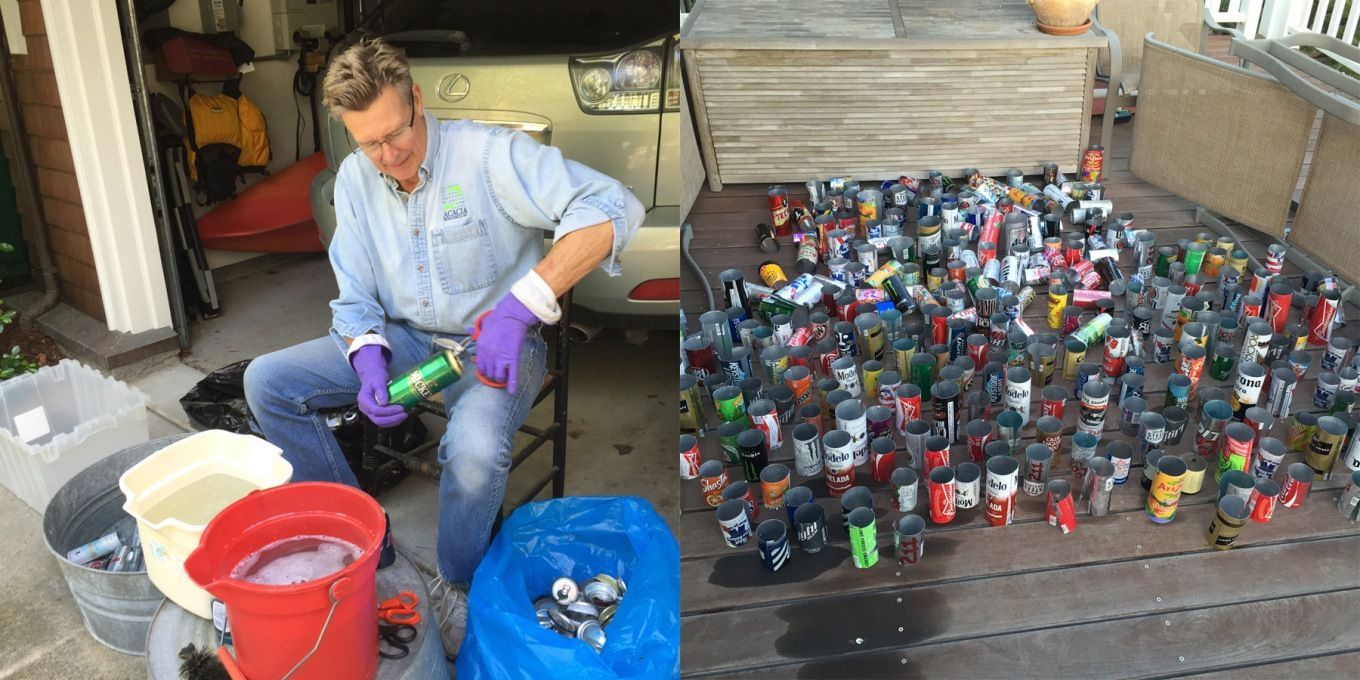 Person sorting colorful cans in a garage beside bins and a large pile of cans