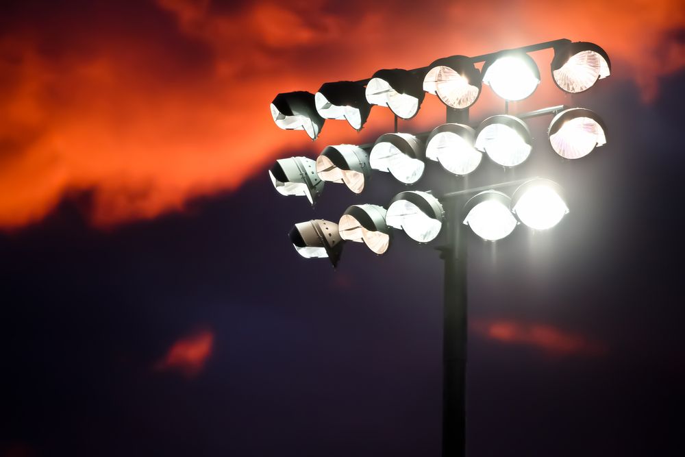 Bright Stadium Floodlights on a Pole Against — CQ Pro-Lec in Pacific Heights, QLD