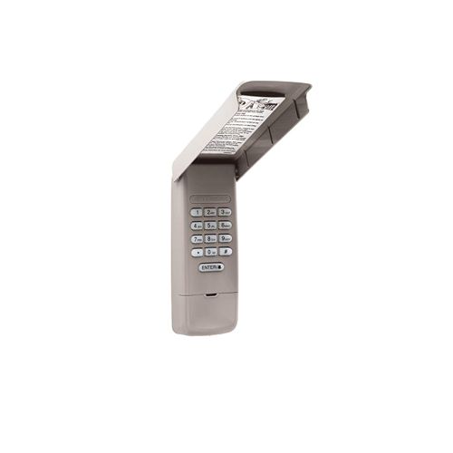Gray public payphone with keypad and hooded handset panel on a white background