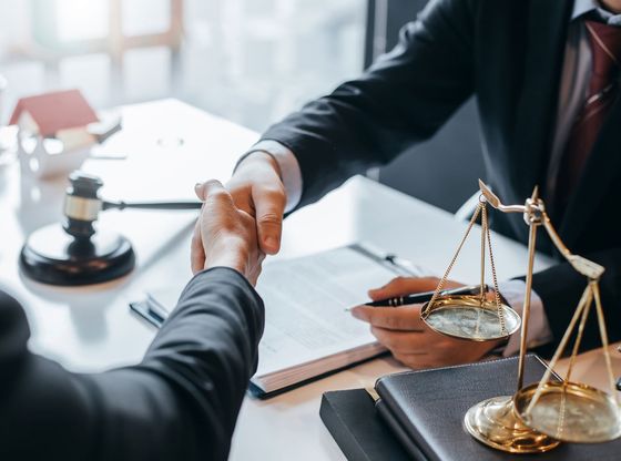 Lawyer And Client Shaking Hands — Wytheville, VA — Scot S. Farthing Attorney at Law, PC