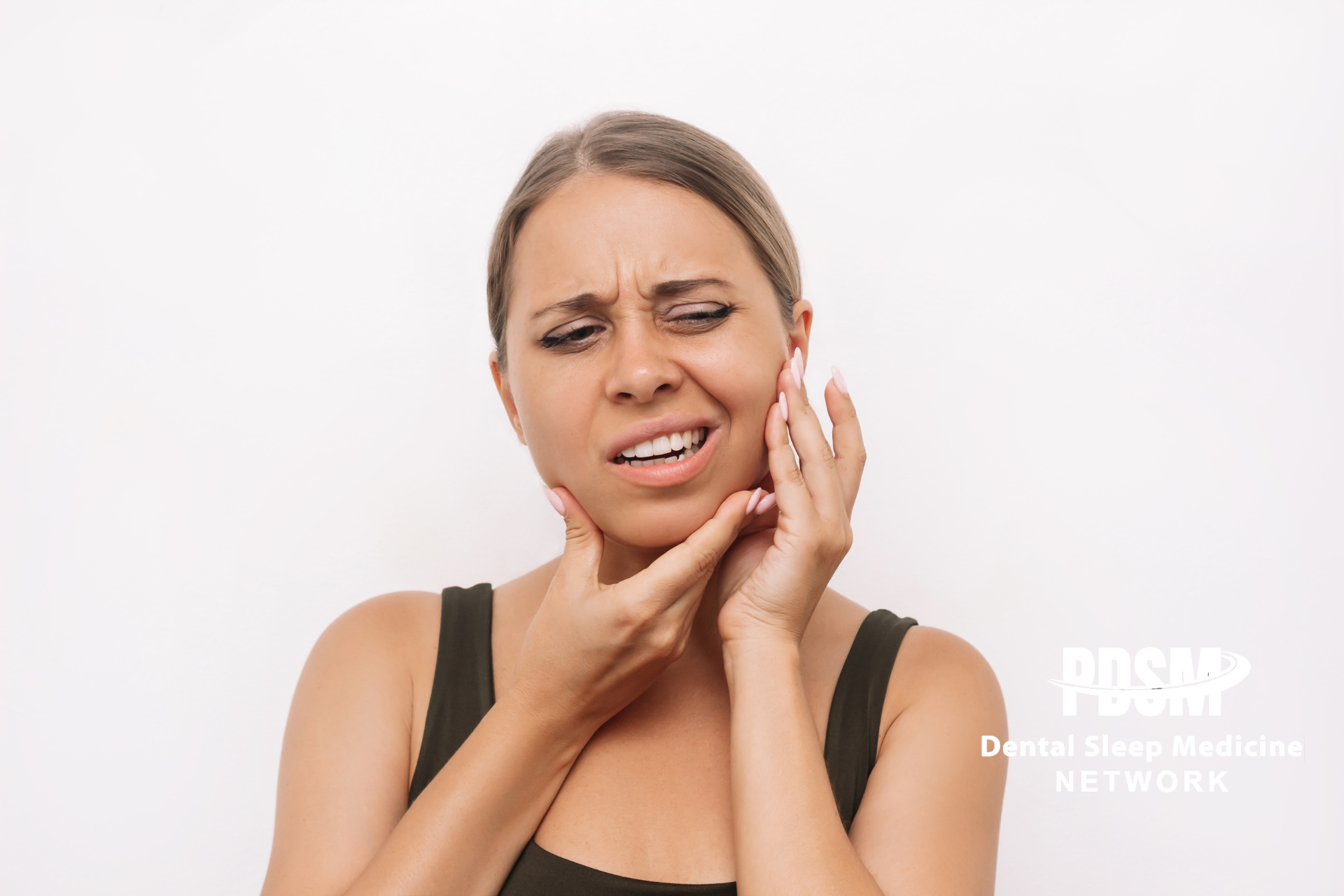 woman adjusting jaw