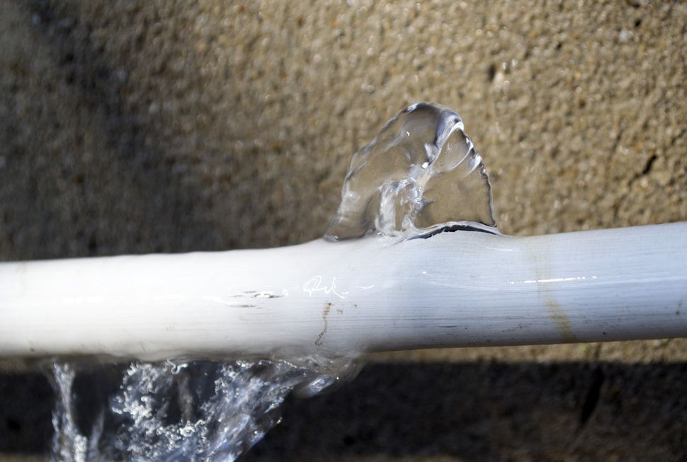 Water Is Coming Out Of A Hole In A Pipe — Flavell Plumbing (NT) Pty Ltd In Ciccone, NT