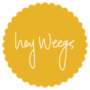 Yellow scalloped circle logo with white handwritten text reading &ldquo;hey Weegs&rdquo;