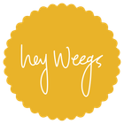 Yellow scalloped circle logo with white handwritten text reading “hey Weegs”