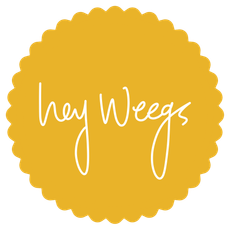 Yellow scalloped circle logo with white handwritten text reading “hey Weegs”