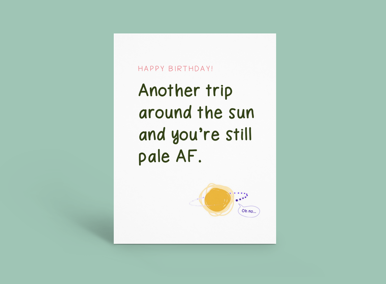 White card with text “Another trip around the sun and you’re still pale AF.” and a small yellow sun illustration.