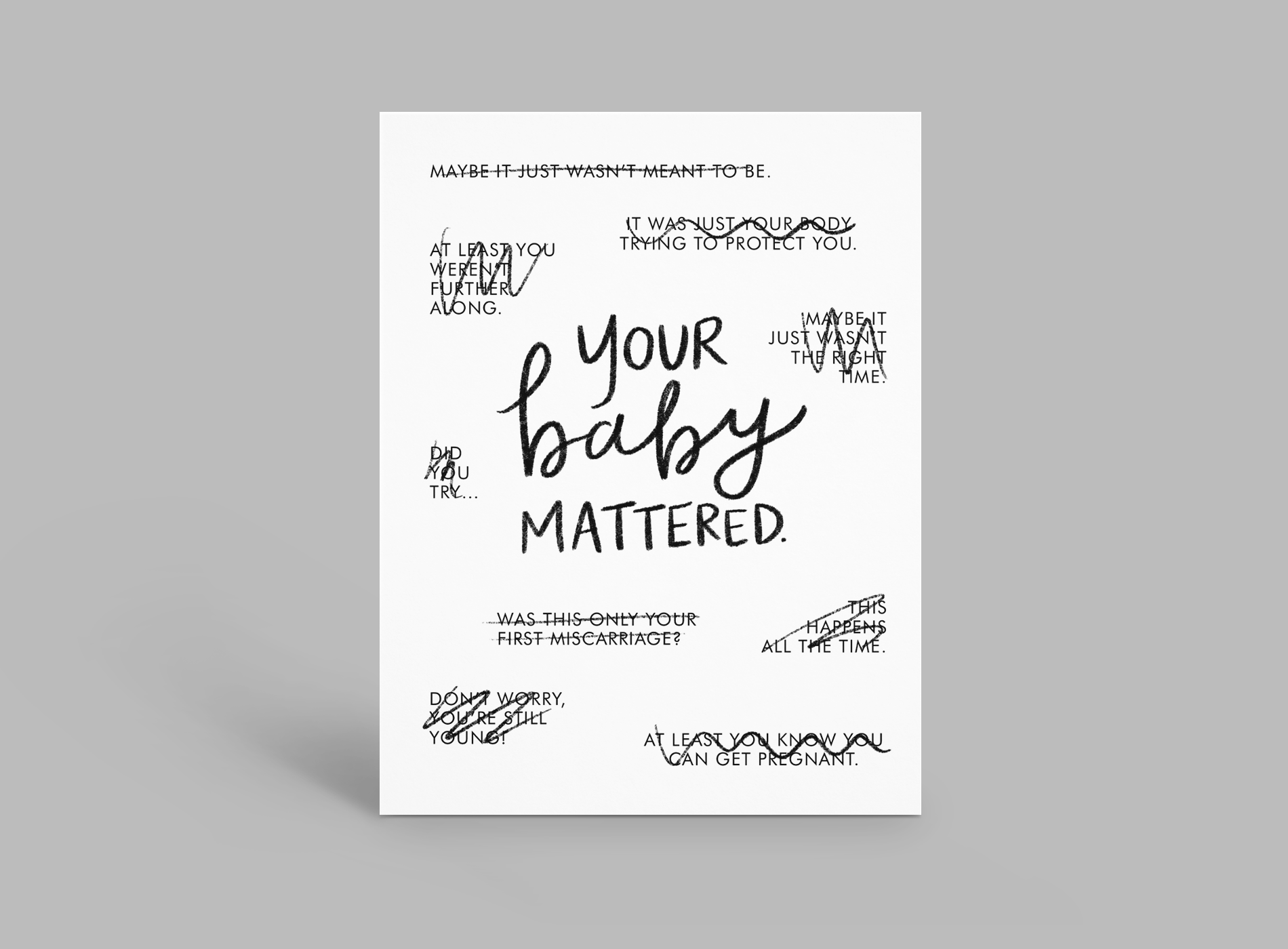 White baby announcement card reading “YOUR baby MATTERED” in black handwriting style text.