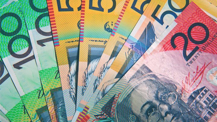 Australian currency notes representing the cash flow pressure faced by small business owners during 