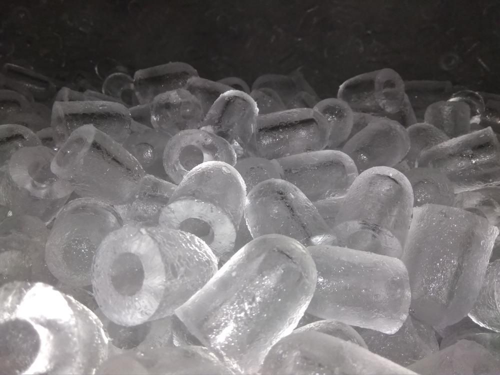A Pile Of Ice Cubes Sitting On Top Of Each Other On A Table — Camden Haven Tyre & Brake Centre In Laurieton, NSW