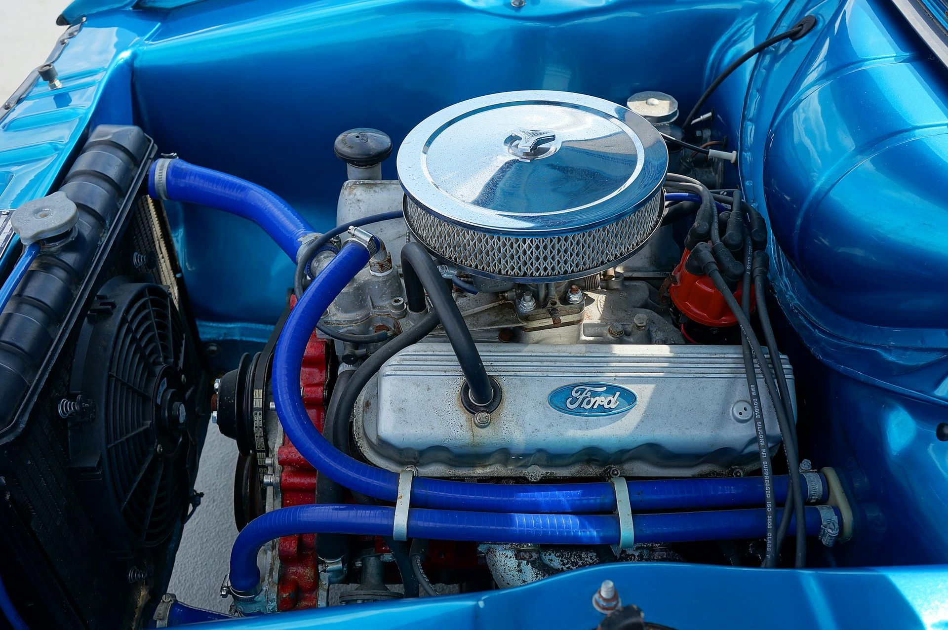 The Engine of a Blue Ford Car is Visible Under the Hood — Camden Haven Tyre & Brake Centre In Laurieton, NSW