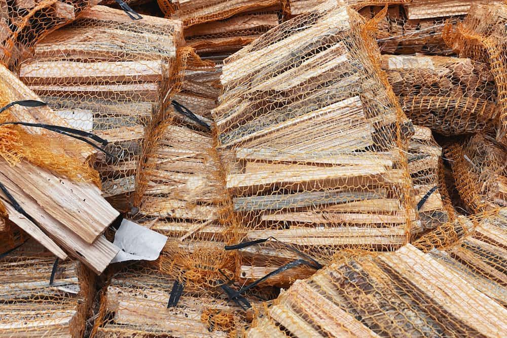 A Pile of Wood is Sitting on Top of Each Other on a Table — Camden Haven Tyre & Brake Centre in Laurieton, NSW