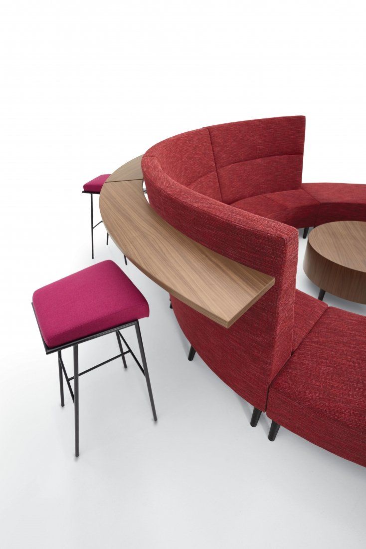 Curved modular sofa with work shelf