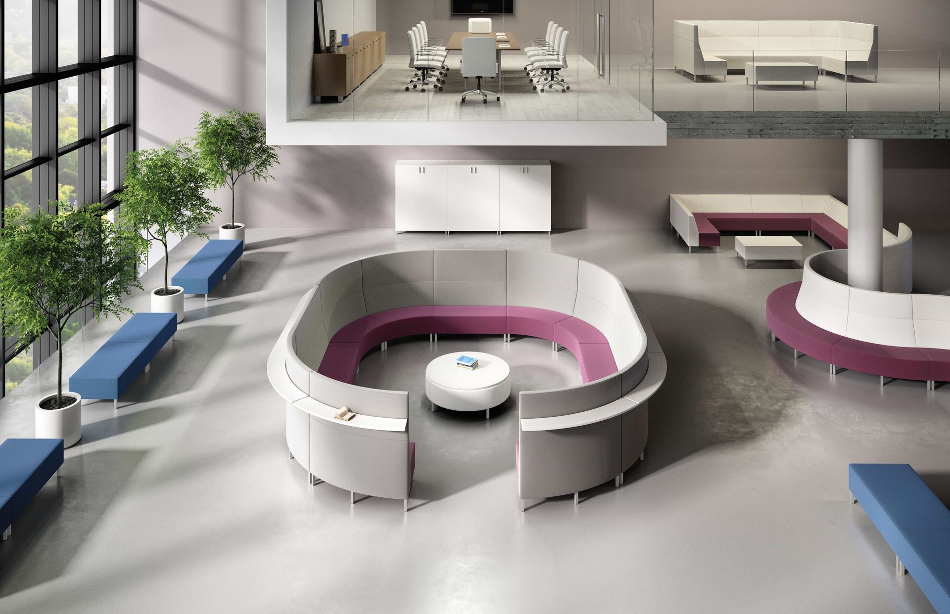 Modern office meeting area with curved sofas, various seating, and white tables.