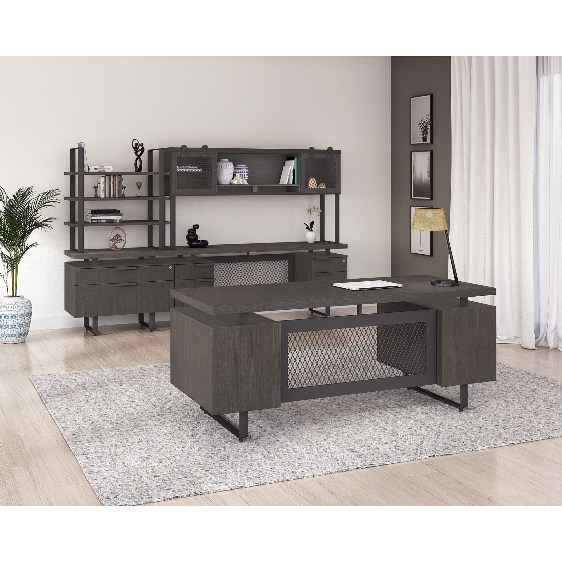 a room with a desk and shelves and a lamp