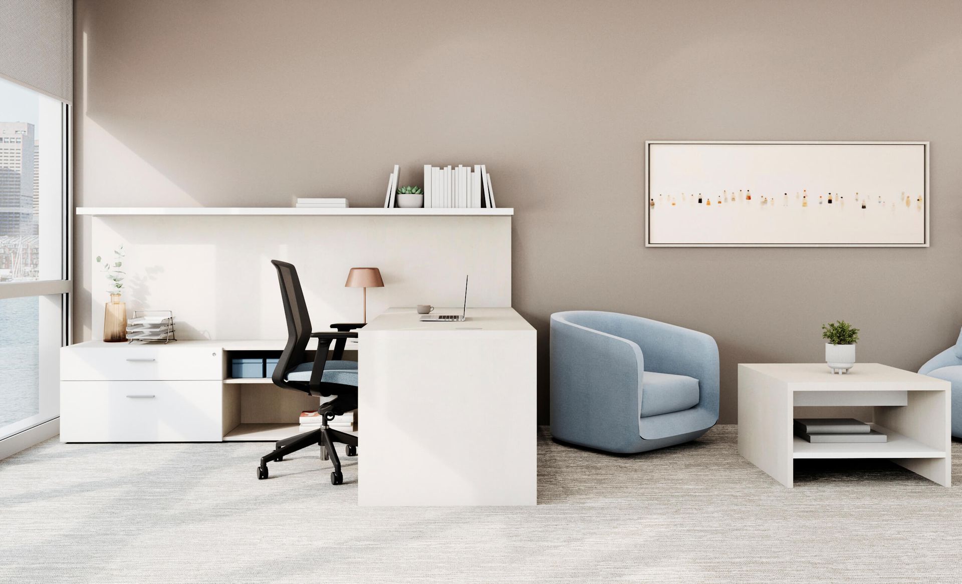 Modern office space with white desk, black chair, blue armchair, and neutral walls.