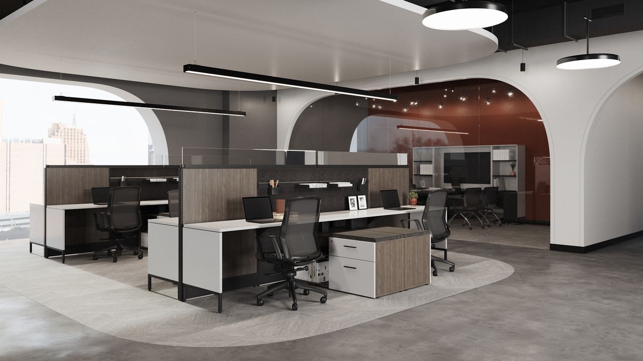 Modern office with dual workstations, archways, white and wood furniture, gray flooring, black chairs.