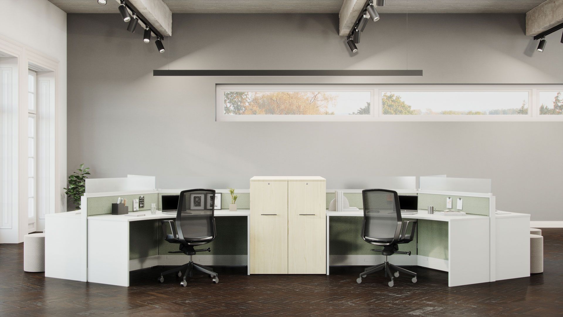 Office workstation with chairs, storage cabinet, and large windows. Gray walls and dark floor.