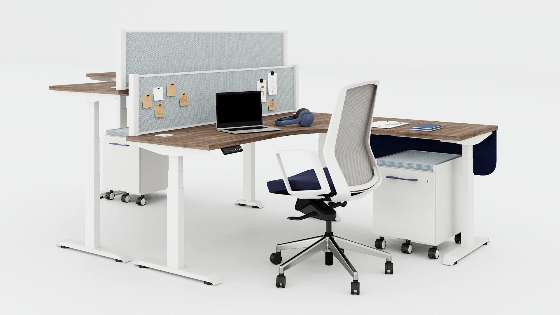 Office workstation with desk, chair, laptop, and storage, with a neutral color scheme.