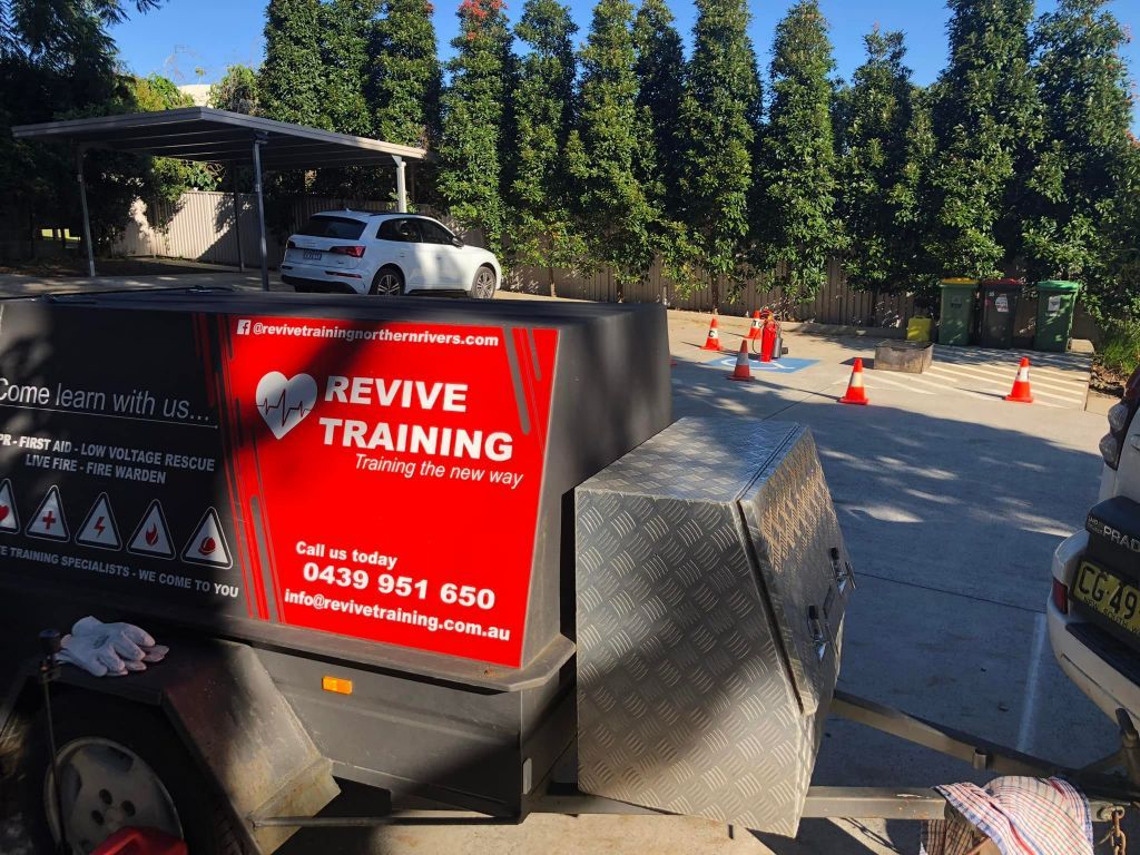 Trailer With Revive Training Sign Parked at a Roadwork Site — Revive Training in Alstonville, NSW