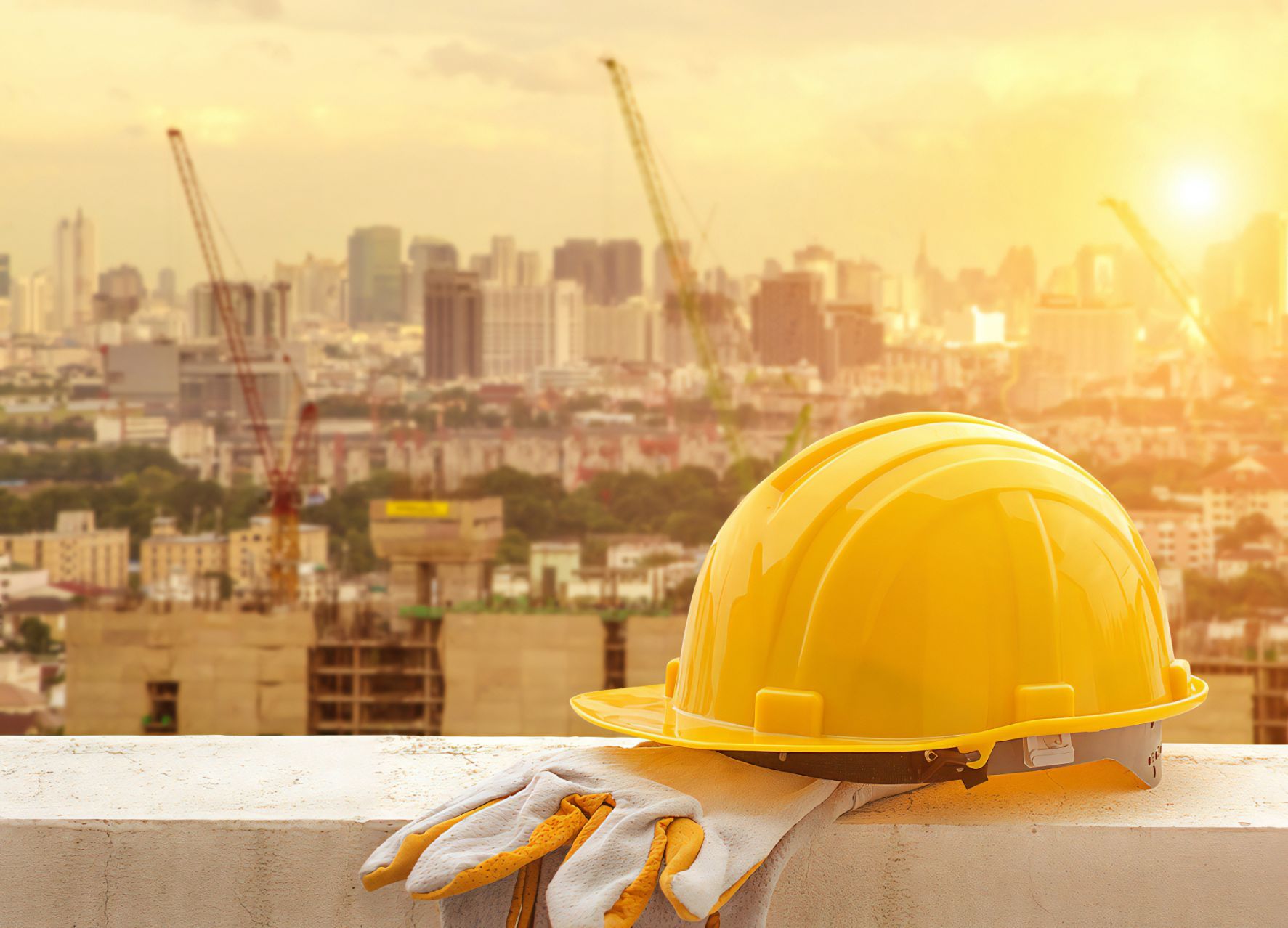 A Hard Hat and Gloves Are Sitting on a Ledge — Revive Training in Tweed Heads, NSW