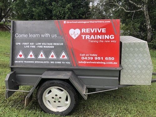 Red Trailer With Revive Training Safety Signage and Equipment — Revive Training in Alstonville, NSW