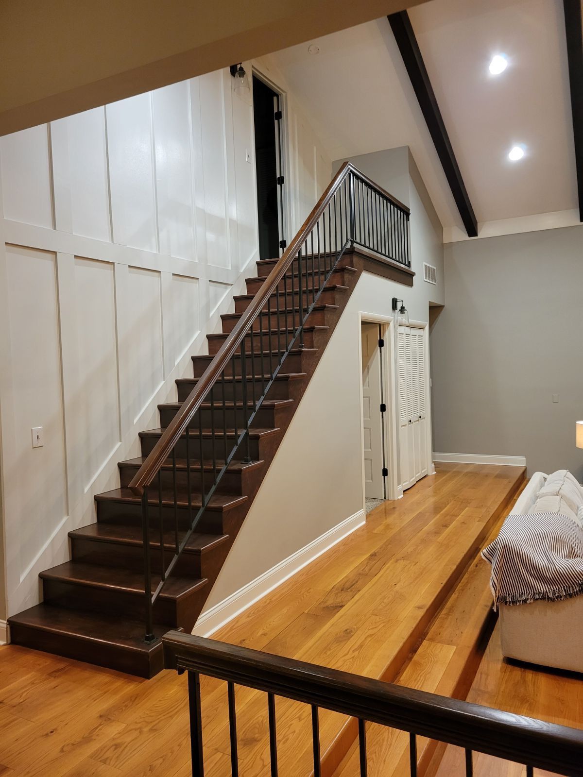 A staircase leading up to the second floor of a house