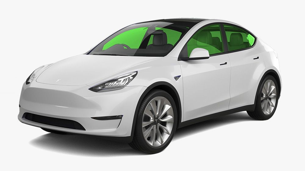 A white tesla model y with green windows on a white background.