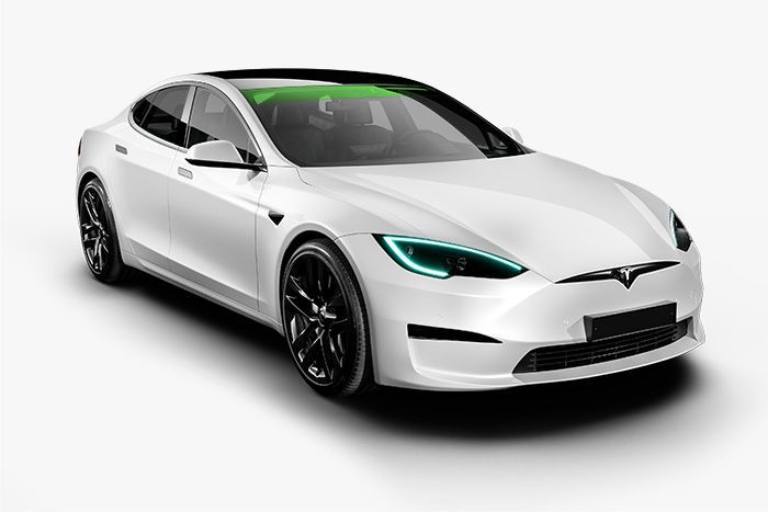 A white tesla model s with green lights on a white background.