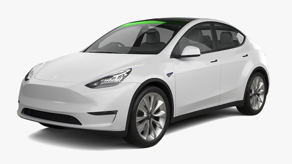 A white tesla model y with a green roof on a white background.