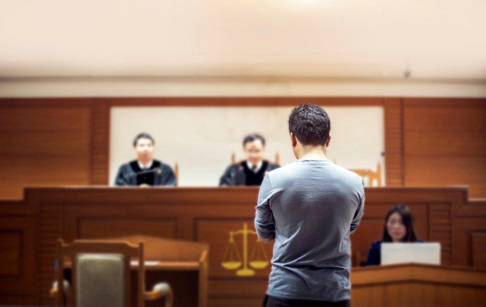 Man Talking to Magistrate in Court — Criminal Lawyer in Gladstone, QLD