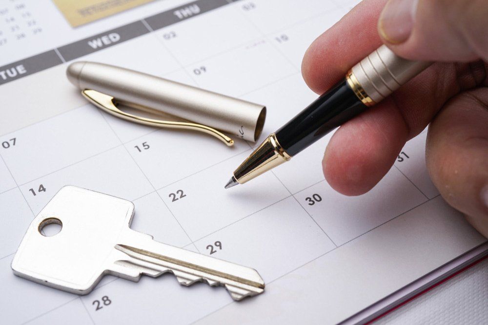 a Property Conceptual with Calendar, Pen and Key — Conveyancing in Gladstone, QLD