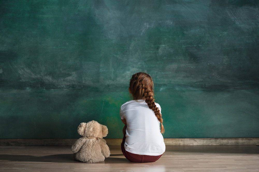 Lonely Child and Teddy Bear — Domestic Violence Lawyer in Gladstone, QLD
