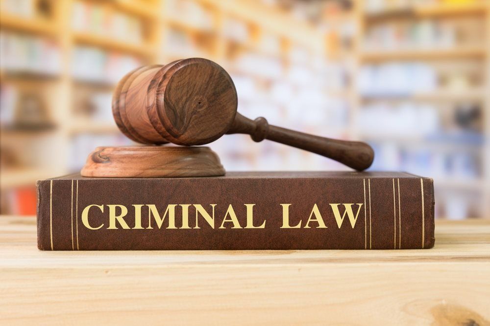 Criminal Law Book & Gavel— Criminal Lawyer in Gladstone, QLD