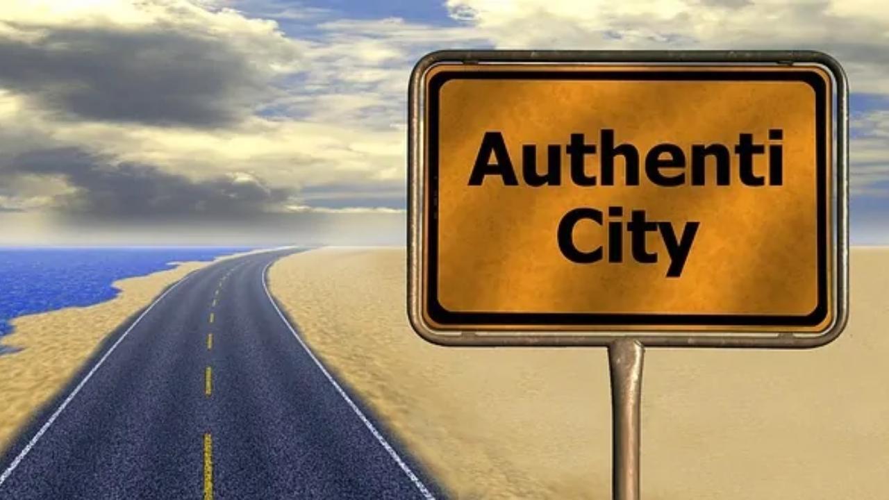 A road with a sign that says authentic city