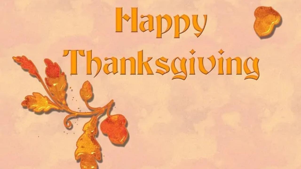 A happy thanksgiving card with leaves and acorns