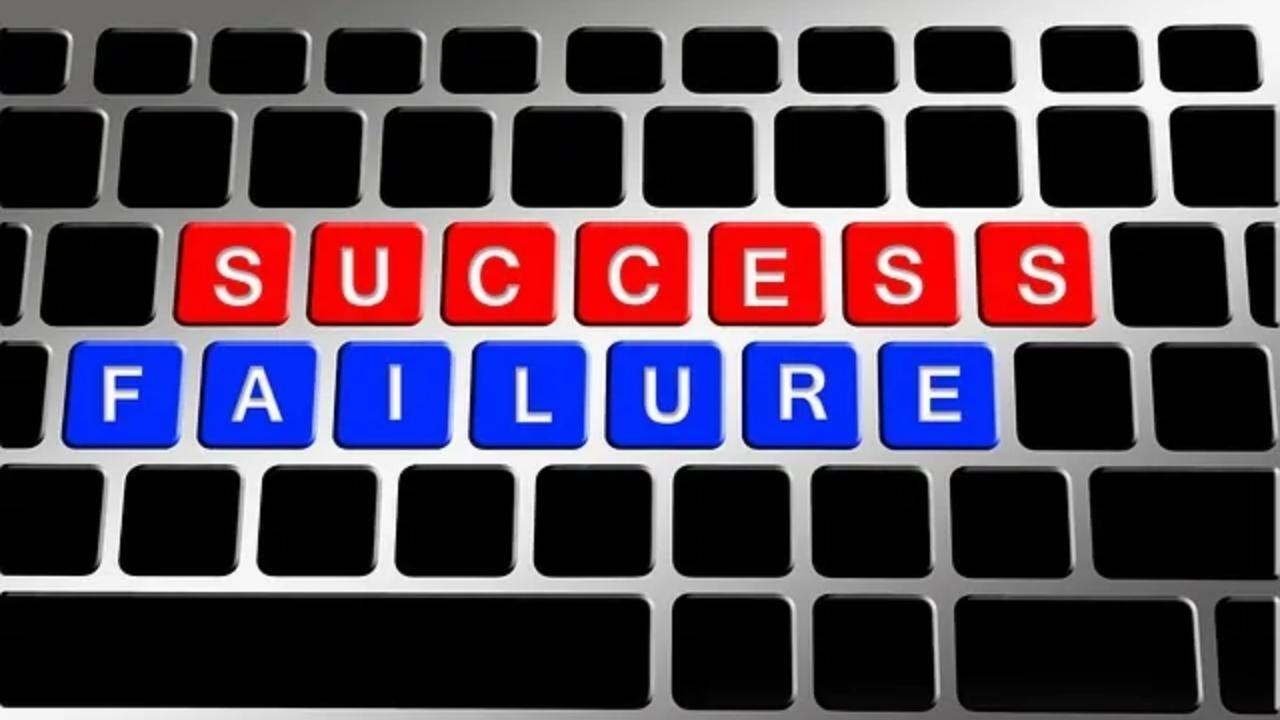 A keyboard with success and failure written on the keys