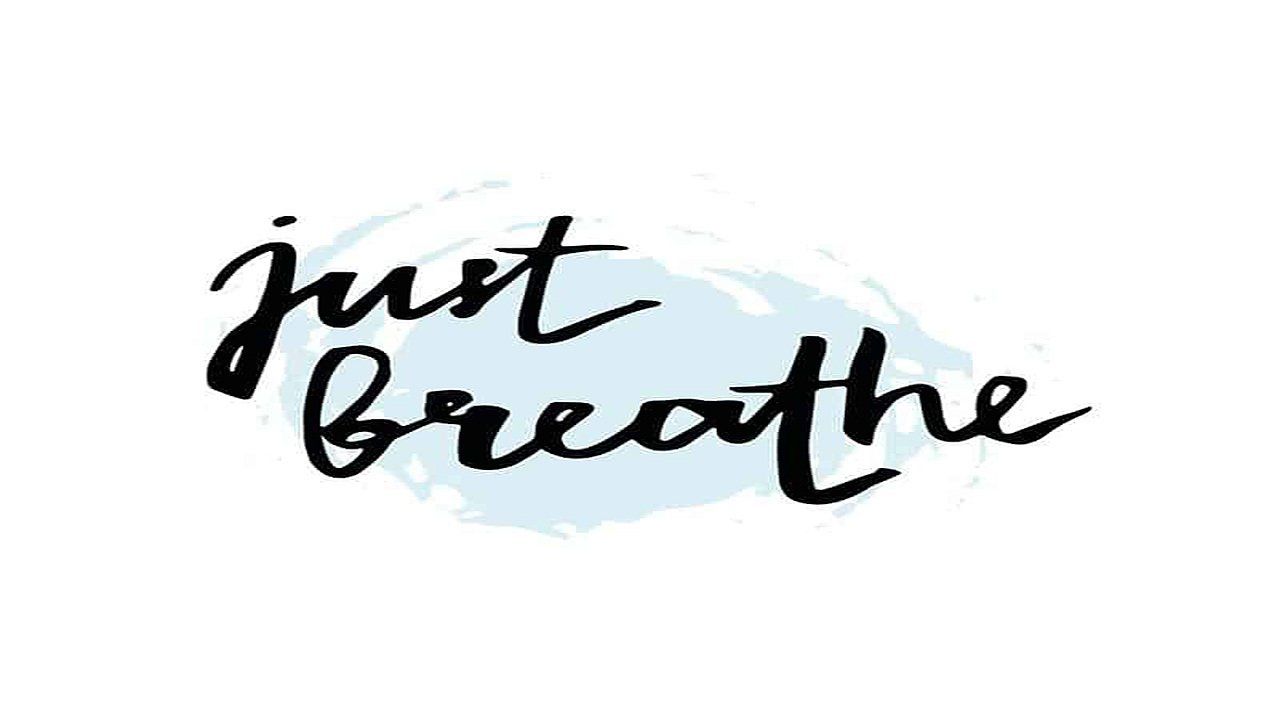 The words `` just breathe '' are written in black on a white background.