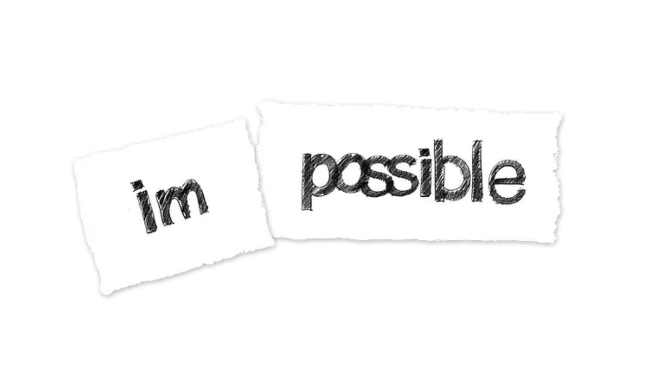 A piece of paper with the words `` im possible '' written on it.