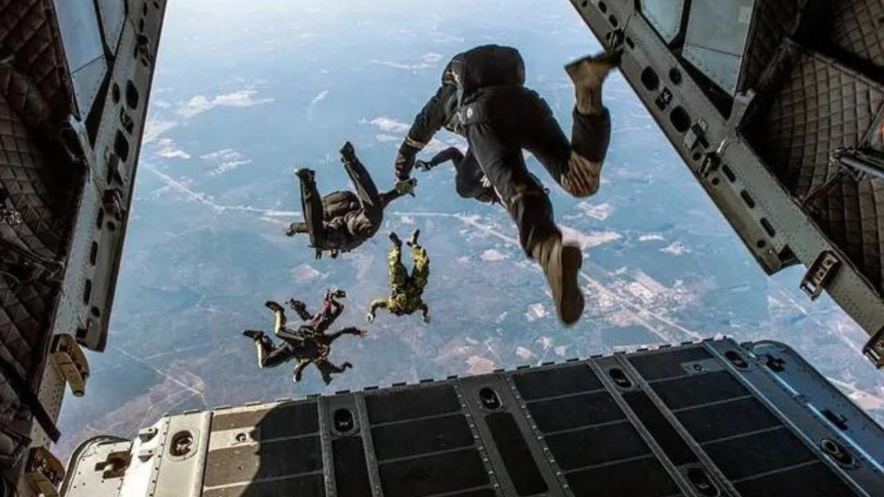A group of people are jumping out of a plane.