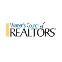 The women 's council of realtors logo is on a white background.