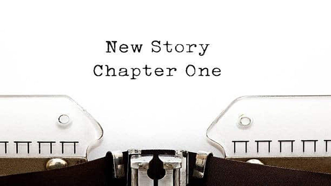 A typewriter with the words new story chapter one written on it