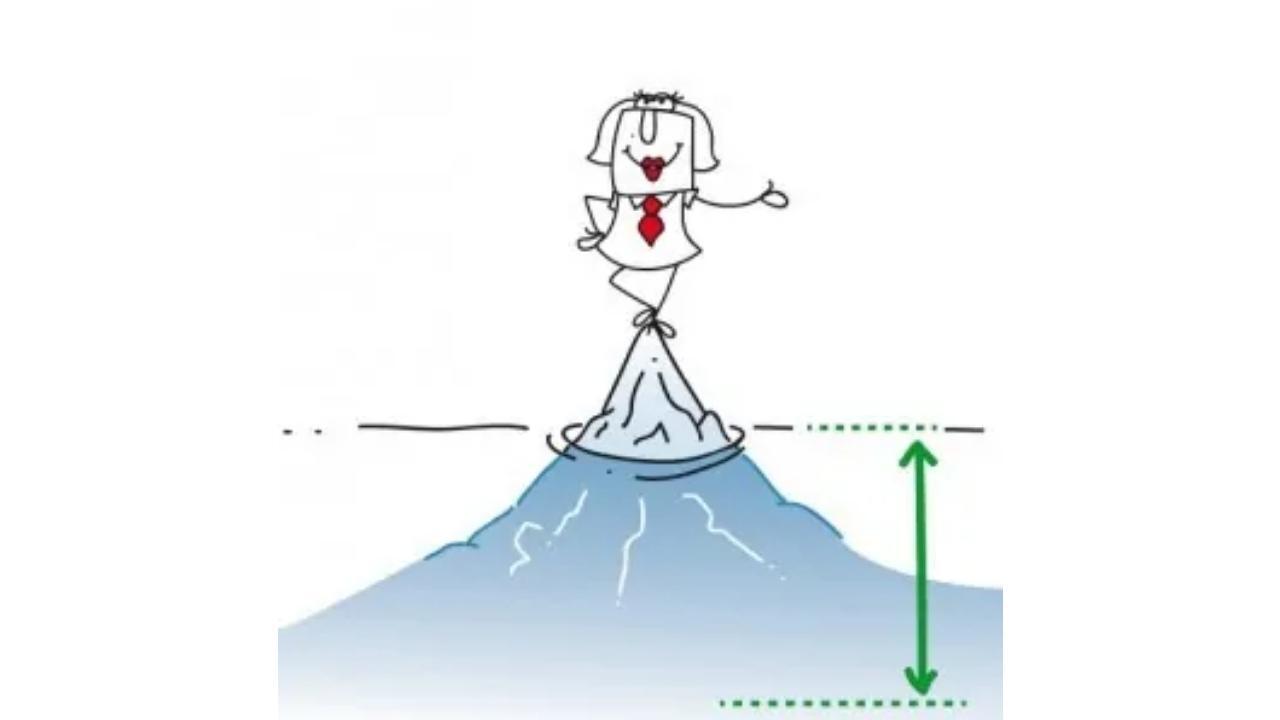 A stick figure is standing on top of a mountain.