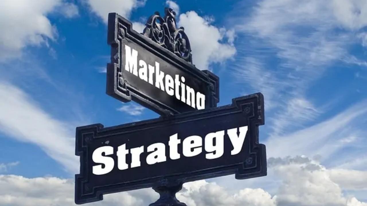 A street sign that says marketing and strategy on it