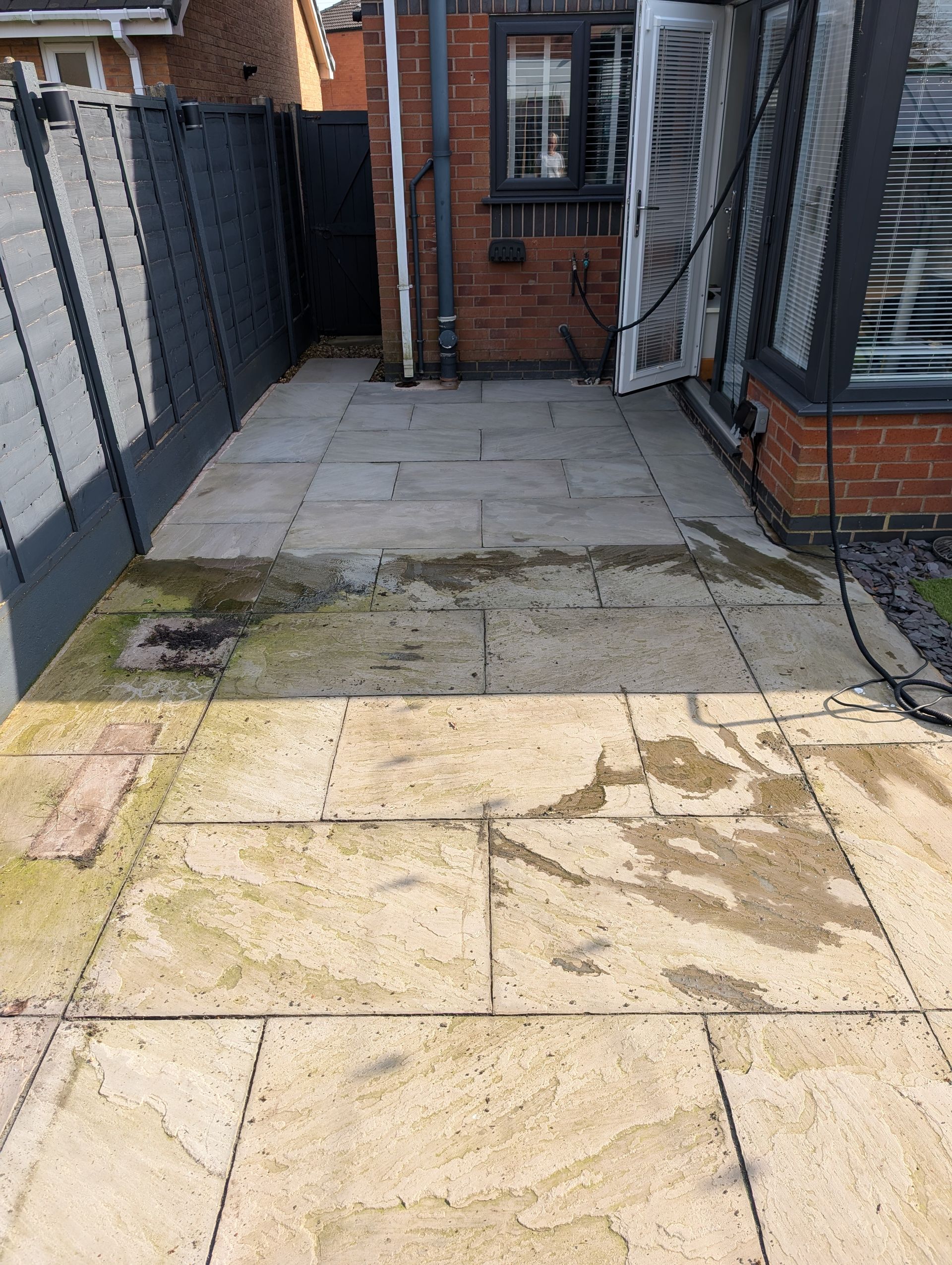 Indian Sandstone Patio Cleaning in Wigan | Before & After