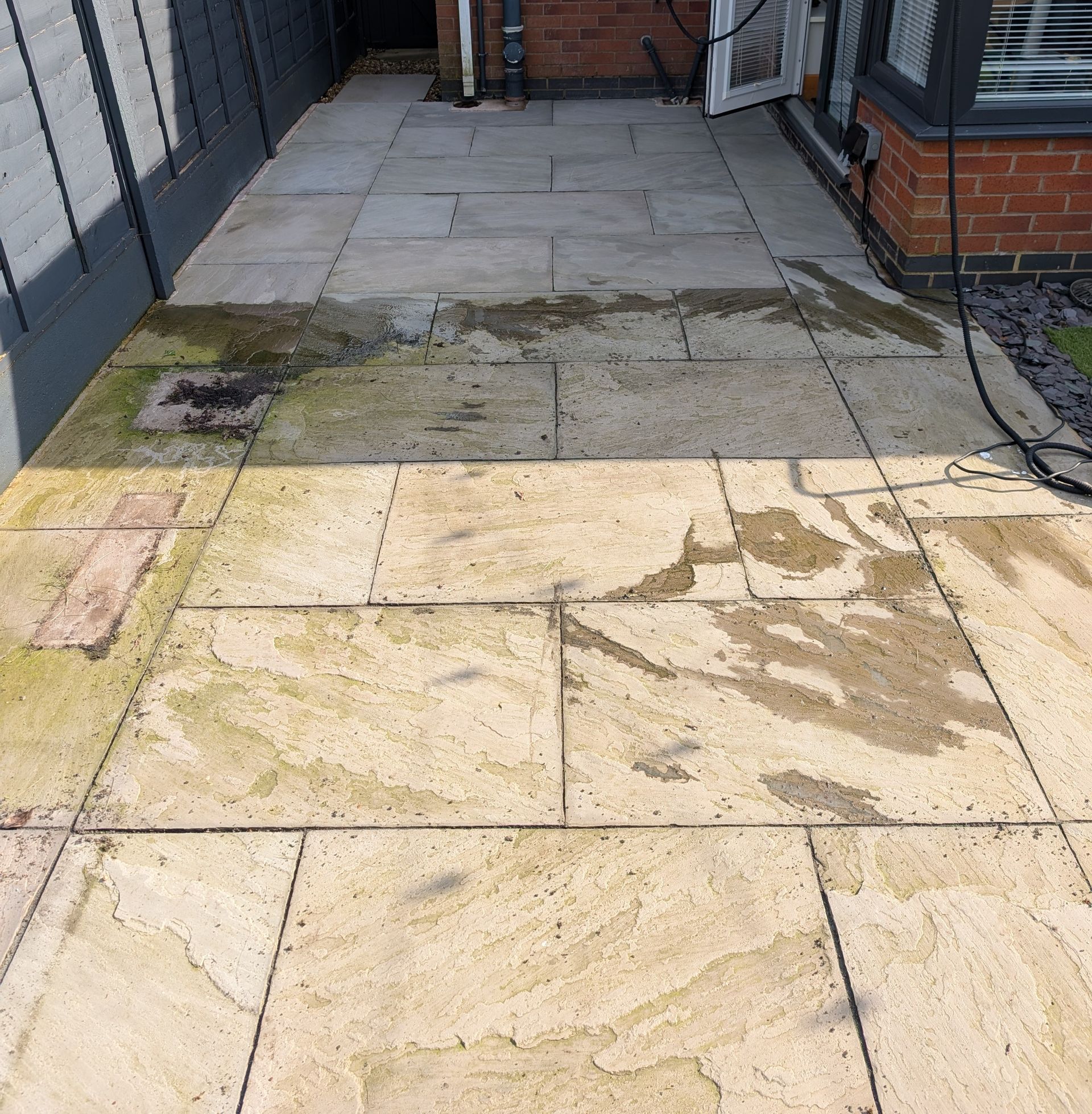 Indian Sandstone Patio Cleaning in Wigan | Before & After
Professional cleaning of an Indian sandstone patio in Wigan removing algae and years of built-up dirt.