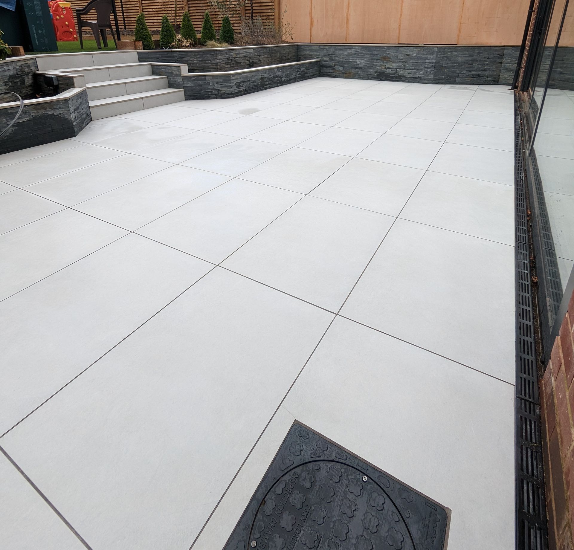 Porcelain tiled patio deep cleaning in Manchester, including grout cleaning