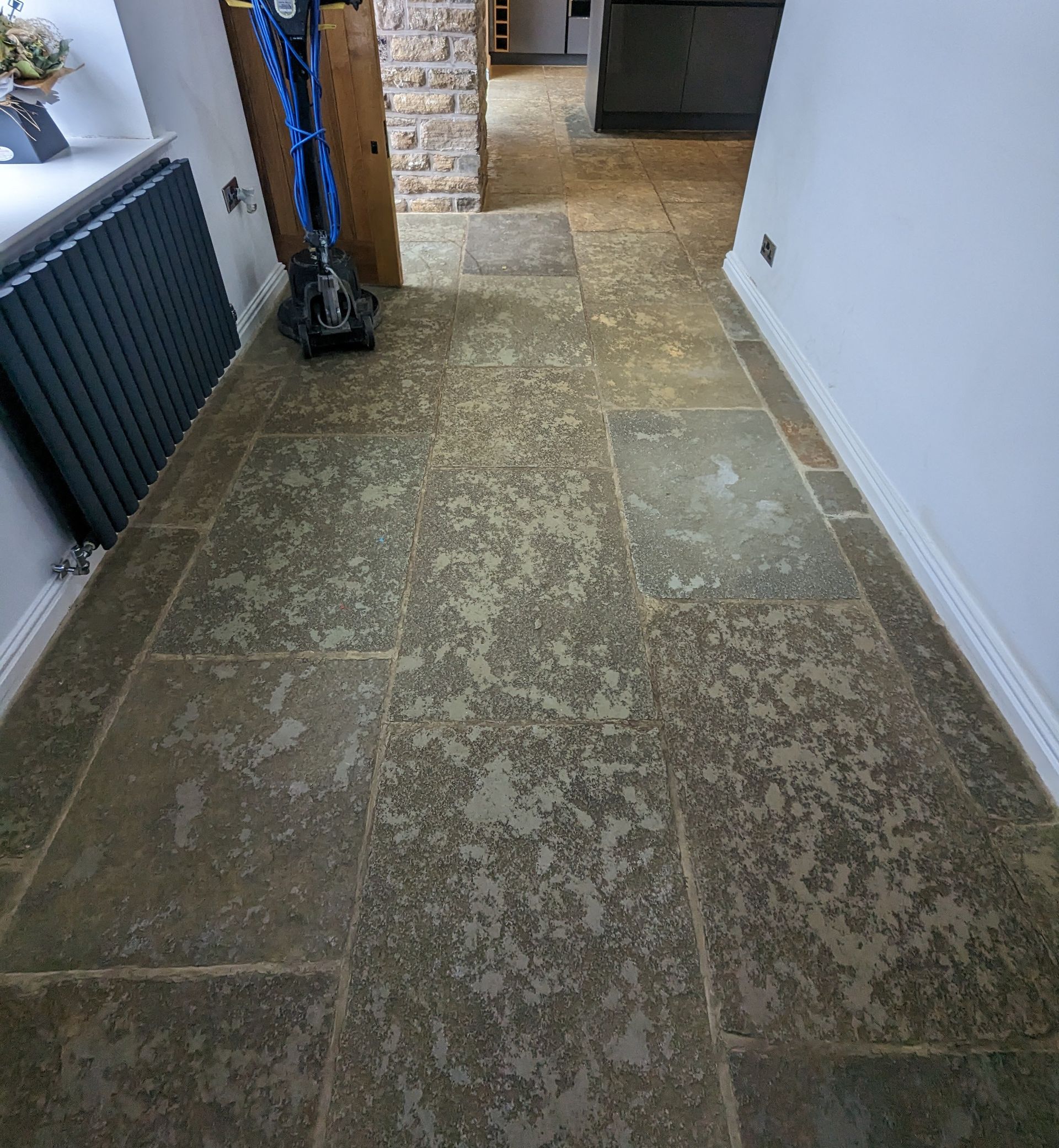 Restoring the elegance: deep cleaning and sealing a stone floor with engrained dirt in Greater Manchester